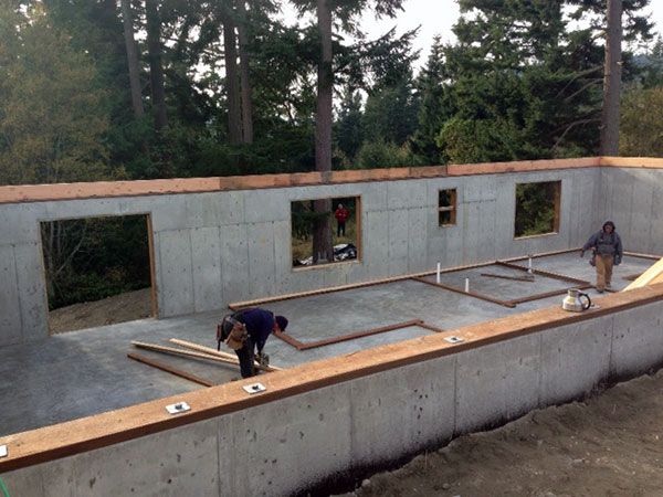 Basement walls and slab poured.