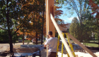 Placing the inside corners, which are housed into 12"x12" Douglas Fir posts.