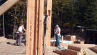 Placing the inside corners, which are housed into 12"x12" Douglas Fir posts.