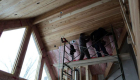 Finishing the tongue and groove ceiling.
