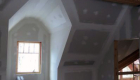 Finishing interior walls around the dormer window.