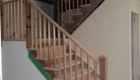 Staircase with wood railings.