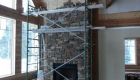 Working on the stone fireplace.