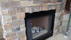 Stonework sets off the fireplace.