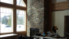 Stonework completed on the fireplace.
