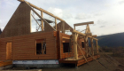 Gable ends framed and ridge beam in place.