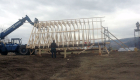 Garage roof being framed on the ground prior to lifting into place.