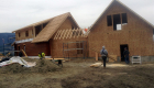 Covered breezeway roof being framed. Breezeways are very popular in colder climates.