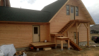 Adding rear stairs to the room above the garage.