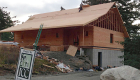Cabin in the woods -- roof being sheeted.