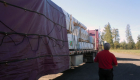 Log delivery day - well tarped load!