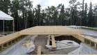 Sub floor framing, water tank in place.