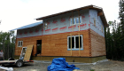 Windows in -- protected from damage until exterior is finished.